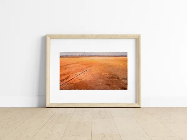 Wide-open desert plains flank a lone highway